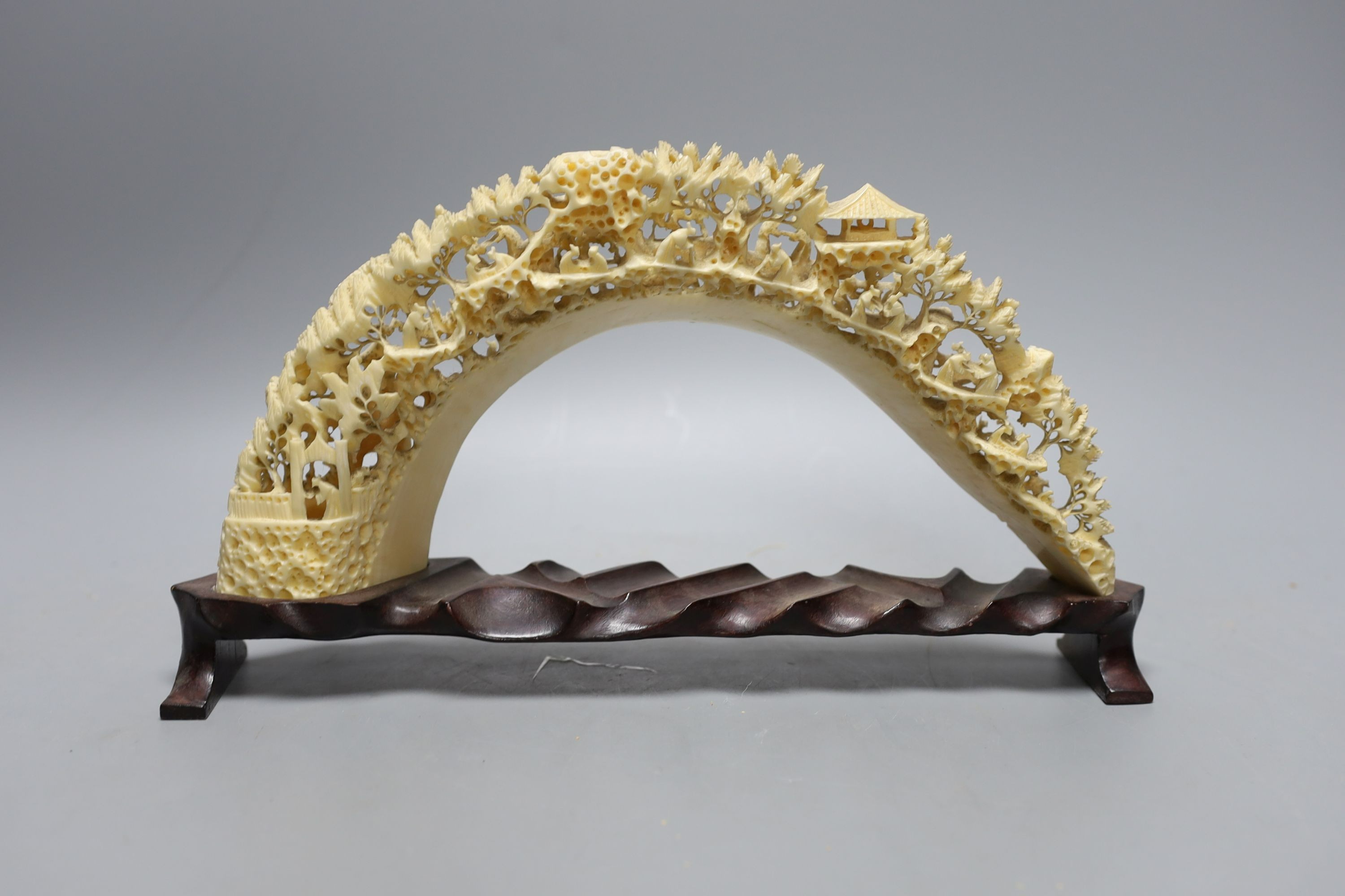 A Chinese boar’s tusk carving 33cm long